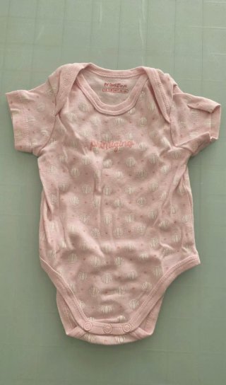Body neonata rosa e fucsia