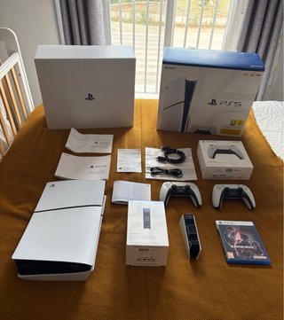 PACK PS5 SLIM 8K 1TB LECTOR (Extras + Garantía)
