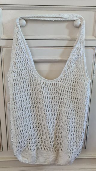 Bolso Stradivarius maxi con perlas plateada