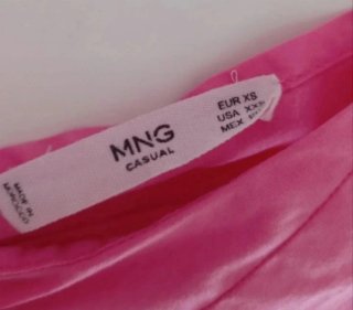 Blusa rosa bajo con volantes T.XS Mango