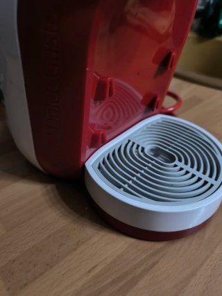 Cafetera Dolce Gusto Roja y Blanca