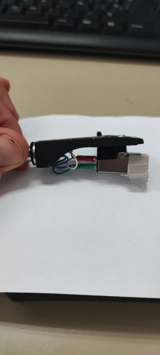 Portacápsulas con cápsula y aguja nuevas.