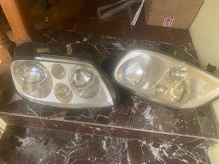 Faros Volkswagen Touran 2004