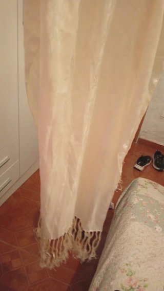 Vestido blanco con flecos