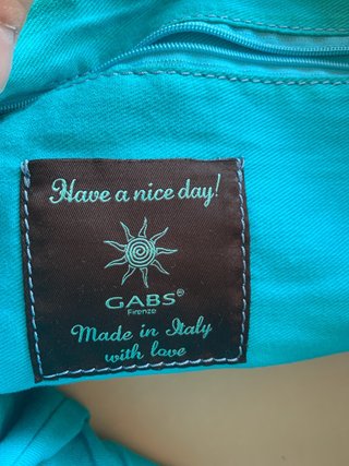 Bolso de cuero morado
