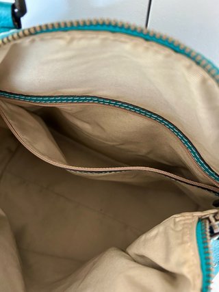 Bolso Purificación García azul turquesa