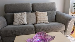 Sofá de tela gris para salón