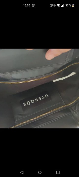 Bolso Uterqüe cuadros negro y gris
