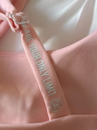 Top deportivo NO PUBLIK SPORT naranja pastel