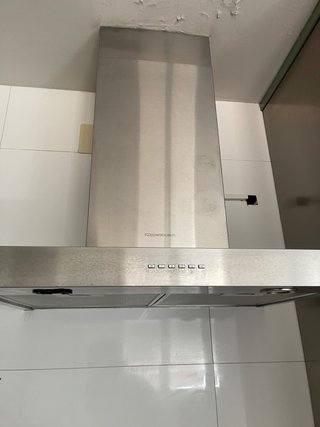 Cocina modular verde y plateada