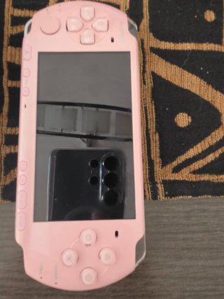 PSP 3000 Rosa y Morado + UMDs
