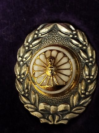 medalla antigua japonesa de conductor de tren