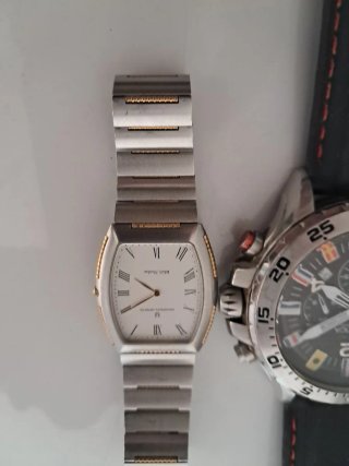Dos relojes Nautica