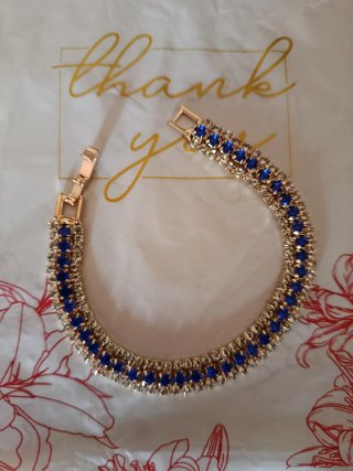 Bracciale tennis oro con zirconi blu e bianchi