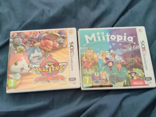 New Nintendo 2DS XL + funda + juegos