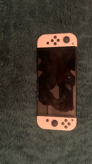 Nintendo Switch OLED + Funda + SD de regalo