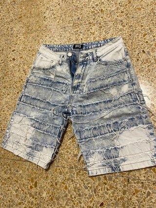 Pantalón corto IMPACT roto desgastado
