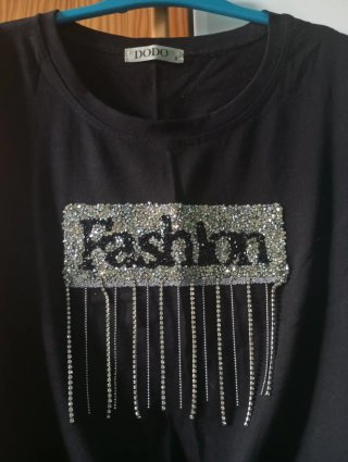 Top negro Fashion con brillitos y flecos