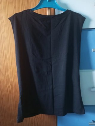 Top negro Fashion con brillitos y flecos