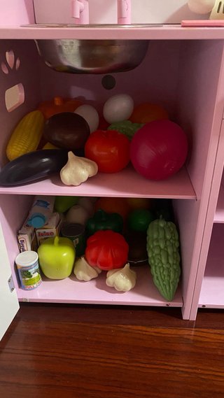 Cocina de juguete de madera rosa
