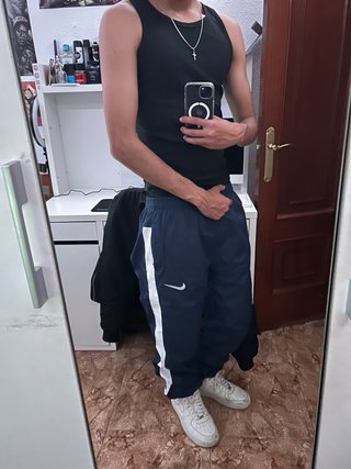 Pantalón deportivo Nike azul y blanco
