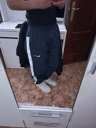 Pantalón deportivo Nike azul y blanco