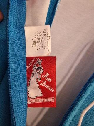 Traje de flamenca azul con volantes