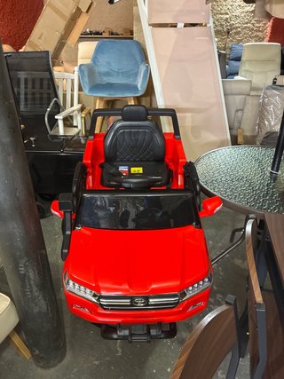 Coche eléctrico infantil rojo