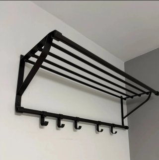 Perchero de pared metálico negro
