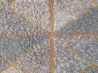 Alfombra artesanal de lana