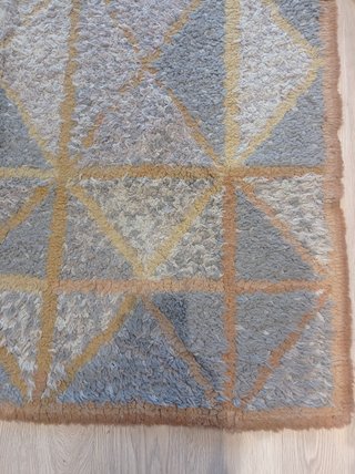 Alfombra artesanal de lana
