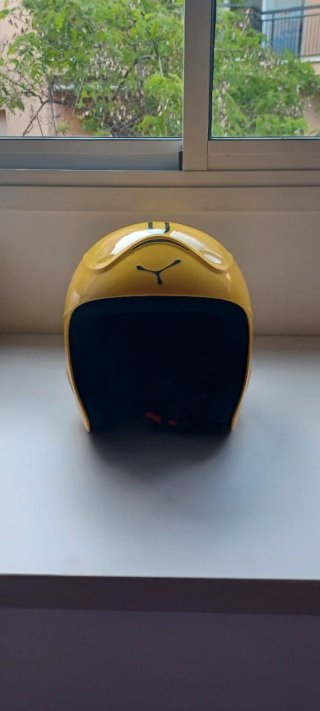 Casco de esquí amarillo infantil