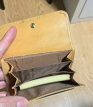 Cartera monedero beige con flor