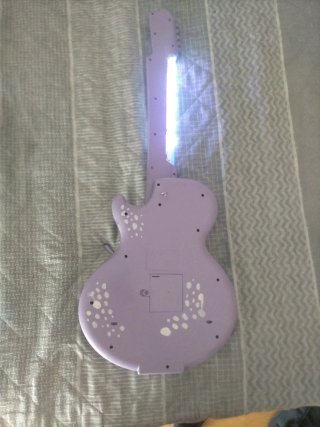 Guitarra de juguete customizada