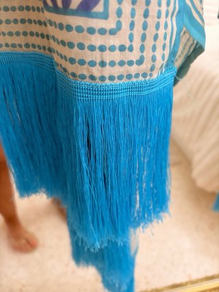 Chaleco con flecos beige y azul