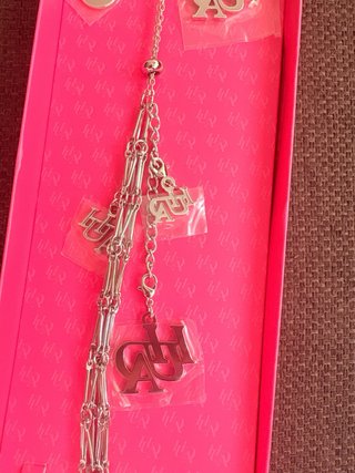Llavero Charm Pata Perfume Plata