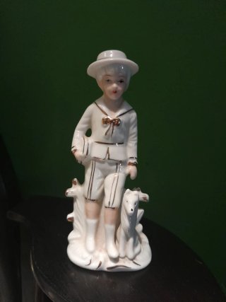 Statuetta porcellana ragazzo con cane
