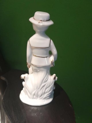 Statuetta porcellana ragazzo con cane