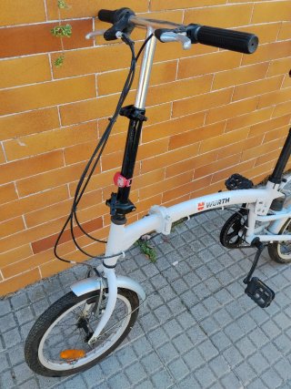 Bicicleta plegable blanca