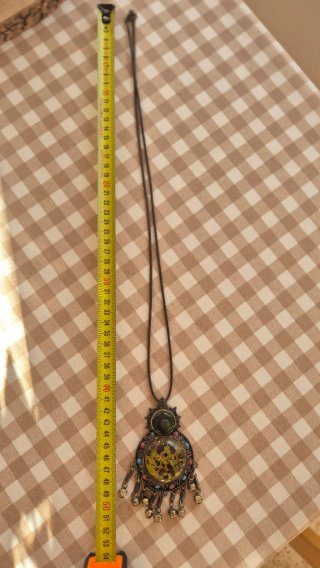 Collar artesanal con ámbar y detalles