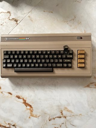 Commodore 64 con Datasette, Drive, Stampante,
