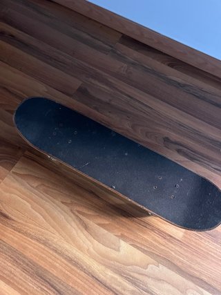 Tabla de skate con diseño de guepardo