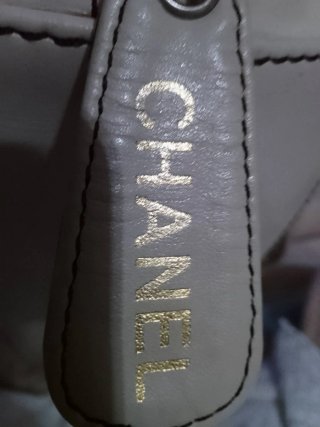 Borsa Chanel bianca e dorata in pelle