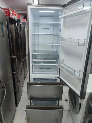 Nevera Haier plateada 200/60cm clase E con garantí