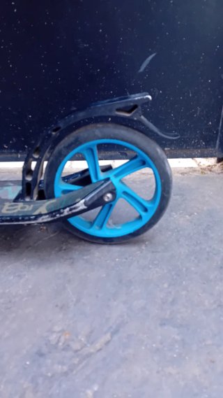 Patinete Oxelo azul y negro