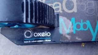 Patinete Oxelo azul y negro