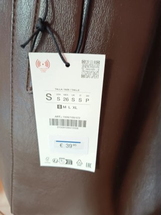 Bolso Zara polipiel marrón alto bolsillo