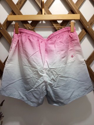 Bañador Primark degradado rosa.