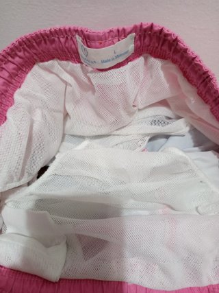 Bañador Primark degradado rosa.