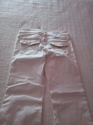 Vaqueros blancos campana bajos elásticos